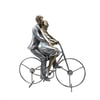 Metallic Sculpture of a Couple on a Bicycle