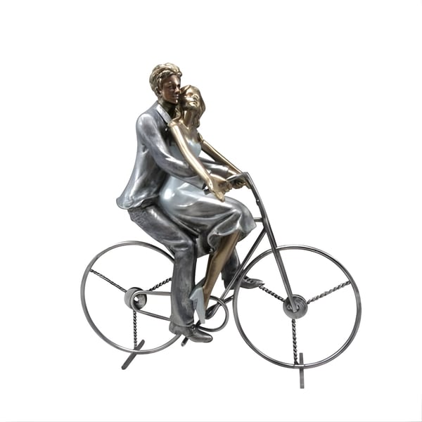 Metallic Sculpture of a Couple on a Bicycle