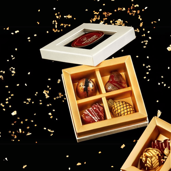 מארז רביעיית פרלינים כולל אלכוהול, אגוזים, פירות ועוד