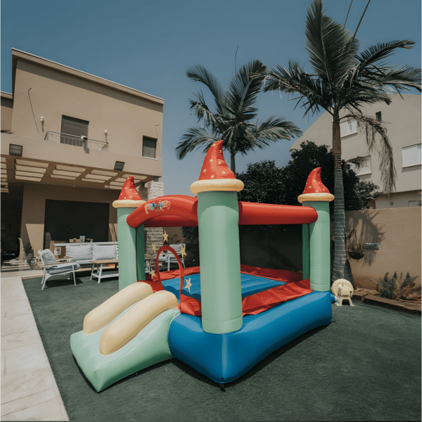 Inflatable 'Magic Castle' Jump House with Slide by Jumpy Jump
