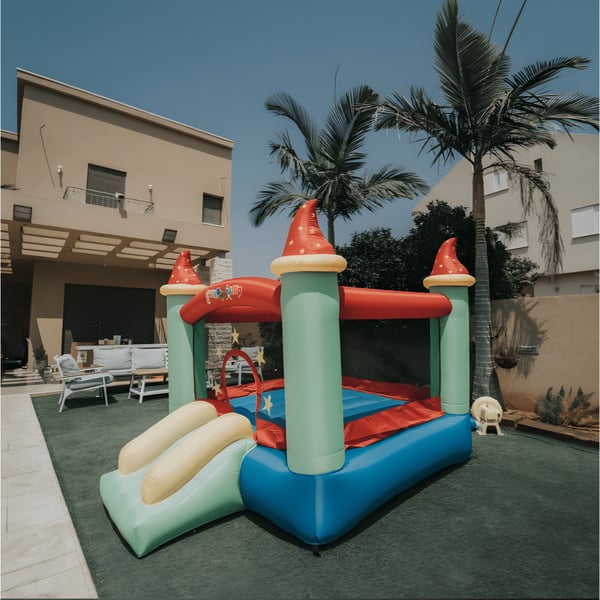 Inflatable 'Magic Castle' Jump House with Slide by Jumpy Jump