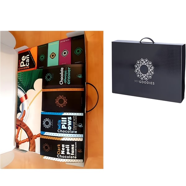 מארז מתנות מפנק עם מגבת חוף ממותגת ומבחר מתוקים איכותיים