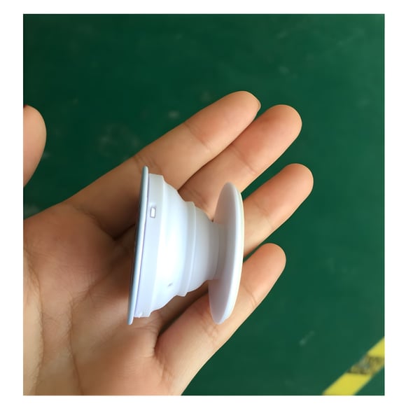Sticky and Springy Smartphone Grip (POP SOCKET)